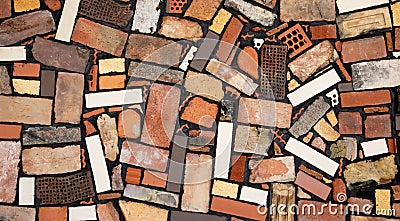 Chaotic bricks wall background, abstract industrial texture Editorial Stock Photo