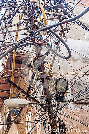 Chaotic mess of electric cables in the center of Delhi, Ind Editorial Stock Photo