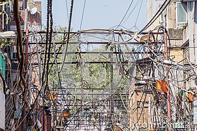 Chaotic mess of electric cables in the center of Delhi, Ind Editorial Stock Photo