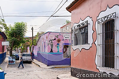 Artistic building facades painted by traditional Latin American style Editorial Stock Photo