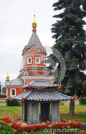 Chapel of Alexander Nevsky and Japanese traditional building model Editorial Stock Photo