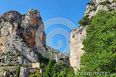 Chapel below the mountain in medieval village Moustiers Sainte Marie Stock Photo