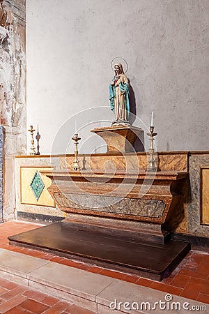 Chapel with an image of Our Lady or Virgin Mary on a marble altar. Hospital de Jesus Cristo Church. Editorial Stock Photo