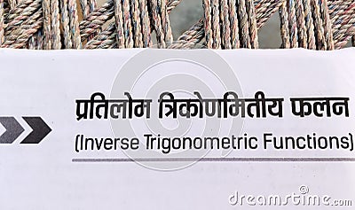 chapter name "inverse trigonometric functions" of Indian mathematics intermediate book written in Hindi and English Stock Photo