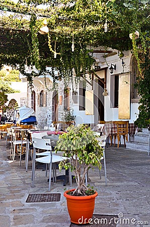 The characteristic cafe on Nisyros island in Greece Editorial Stock Photo