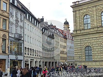 Characteristic crowded street of Munich in Germany. Editorial Stock Photo