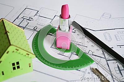 Young woman workplace. House building plan Stock Photo