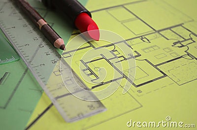 Young woman workplace. House building plan Stock Photo