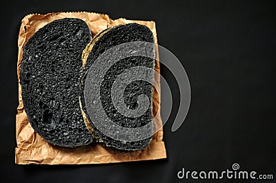 Charcoal black rye bread contains a higher proportion of calcium, potassium, iron, and vitamin E Stock Photo