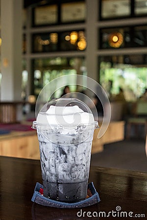 Charcoal Latte coffee in Nekoemon cafe chiang mai thailand Stock Photo