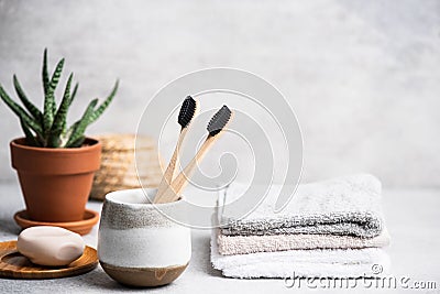 Charcoal toothbrush in bathroom Stock Photo