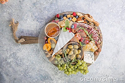 Charcuterie board. Cheese platter. Assortment of tasty appetizers or antipasti. Top view. Copy space Stock Photo