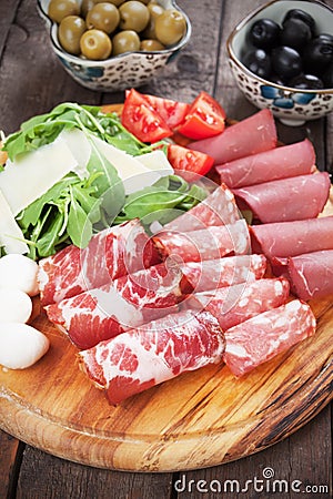 Charcuterie board with italian cured meat Stock Photo