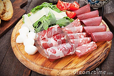 Charcutertie board with italian cured meat Stock Photo