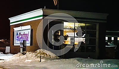 Chardon, Ohio, USA - 2-11-22: A Castrol oil changing shop at night in the winter Editorial Stock Photo