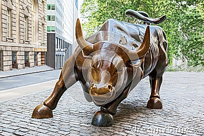 The charging bull statue on wall street in new york city Editorial Stock Photo