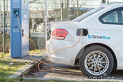 Charging an electric car Editorial Stock Photo