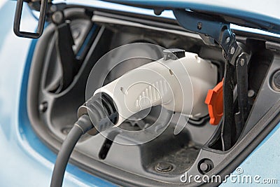 Charging an electric car closeup Stock Photo