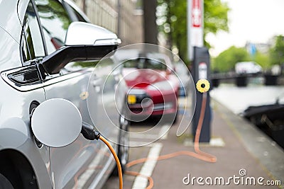 Charging an electric car. Stock Photo