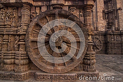 A chariot wheel carved into the wall of the 13th century Konark Sun or surya Temple, Odisha, India. Stock Photo