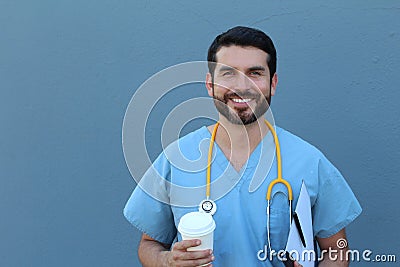Charismatic doctor having a break in the staff room Stock Photo