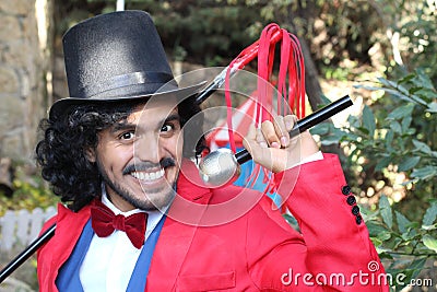 Charismatic ethnic ringmaster in the circus Stock Photo