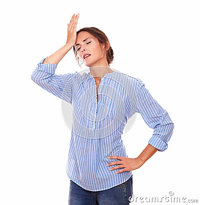 Charismatic hispanic lady with headache standing Stock Photo