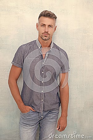 charismatic stylish mature man isolated on grey. stylish mature man in studio. Stock Photo