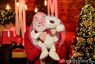 Charity and kindness. Lovely hug. Santa Claus. Mature man with white beard. Christmas spirit. Bearded grandfather senior Stock Photo