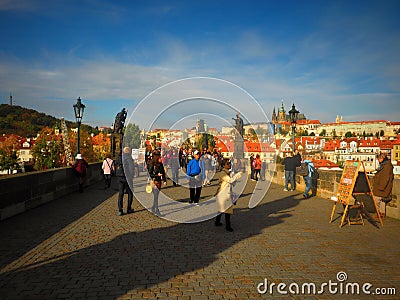 Charles Bridge,historical monument romantic walk through night Prague along the Vltava river with interesting colors,night colors, Editorial Stock Photo