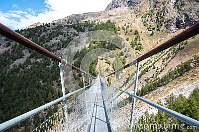 Charles Kuonen suspension bridge in Swiss Alps. With 494 metres, it is the longest suspension bridge in the world in Stock Photo