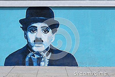 Charlie Chaplin Mural Graffiti on the Wall Editorial Stock Photo