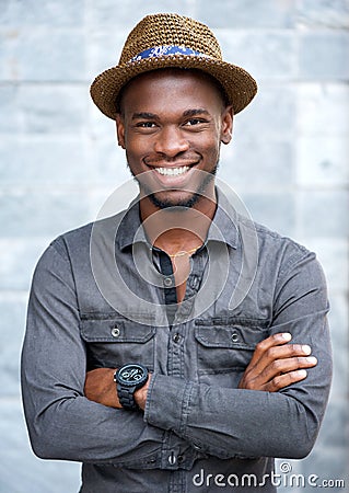 Charming african american man smiling with hat Stock Photo