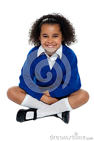 Charming African school girl flashing a smile Stock Photo