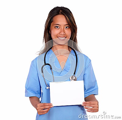 Charming asiatic nurse woman holding a white card Stock Photo