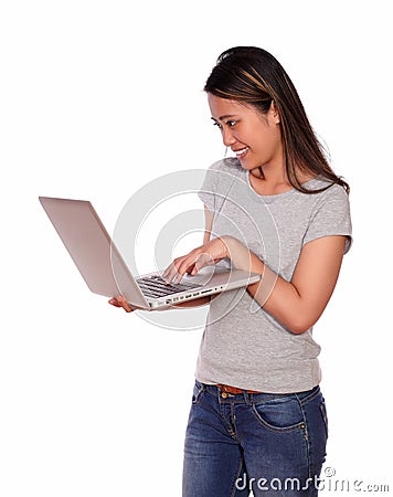 Charming asiatic woman using her laptop computer Stock Photo