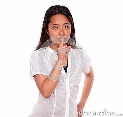 Charming asiatic young woman requesting silence Stock Photo