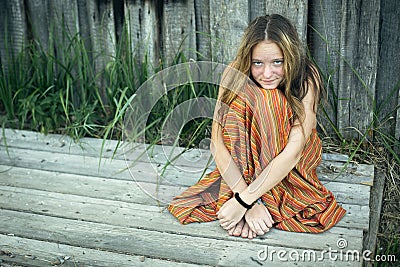 Charming country girl in the outdoor in the village. Stock Photo