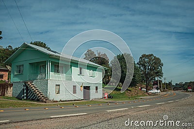 Charming country house next to a road Editorial Stock Photo