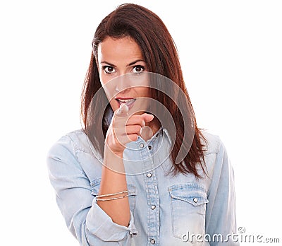 Charming female pointing and looking at you Stock Photo