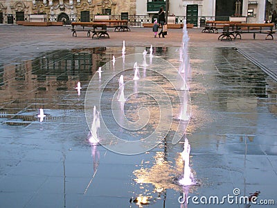 Small fountains in the square. Malta. Valletta. Editorial Stock Photo
