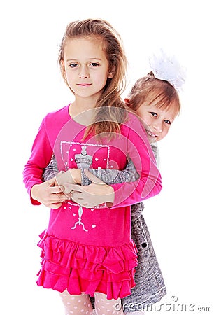 Charming girl sisters smiling cheerfully Stock Photo