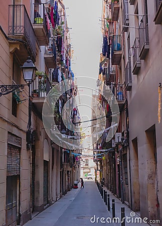 The charming Gothic Quarter, or Barri Gotic, has narrow medieval streets filled with trendy bars, clubs and Catalan restaurants. Editorial Stock Photo