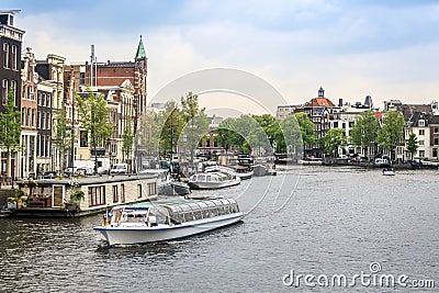 Charming houses and canal in Amsterdam, The Netherlands Editorial Stock Photo