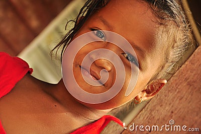 Charming little girl smiling in the village house Editorial Stock Photo