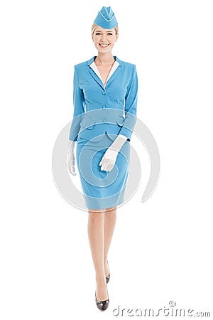 Charming Stewardess In Blue Uniform On White Background Stock Photo