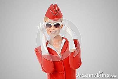 Charming Stewardess In Red Uniform And Vintage Sunglasses Stock Photo