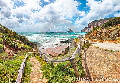 Charming view of beach Portu Cauli in Masua with Pan di Zucchero at background Stock Photo