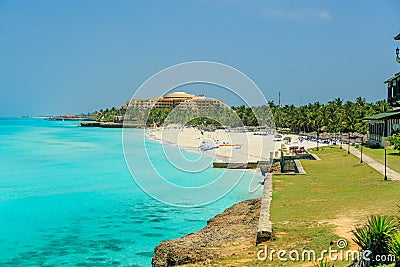 Charming wide open view of tranquil ocean, gorgeous white sand palm beach Stock Photo
