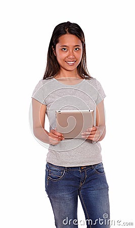 Charming young asiatic woman using her tablet pc Stock Photo